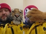 A viral video showed a man snuggling with his pet tiger.