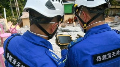 Chinese rescue team members use a device to search for victims trapped in the rubble of a damaged temple in Mandalay on March 30, 2025, two days after an earthquake struck central Myanmar. The massive earthquake killed more than 1,600 people in Myanmar and at least 17 in neighbouring Thailand. (AFP) Chinese rescue team members use a device to search for victims trapped in the rubble of a damaged temple in Mandalay on March 30, 2025, two days after an earthquake struck central Myanmar. The massive earthquake killed more than 1,600 people in Myanmar and at least 17 in neighbouring Thailand. (AFP)