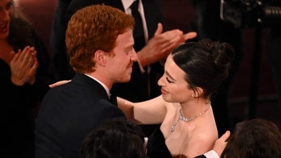 Mikey Madison and her brother Miles at the 97th Annual Academy Awards at the Dolby Theatre in Hollywood, California. (AFP) Mikey Madison and her brother Miles at the 97th Annual Academy Awards at the Dolby Theatre in Hollywood, California. (AFP)