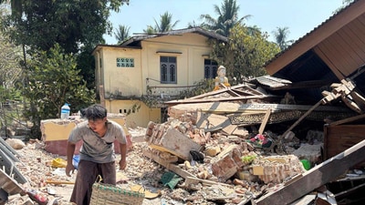 A person goes through rubble at a Buddhist monastery building that has collapsed following an earthquake in Naypyitaw, Myanmar on Sunday, March 30, 2025. Residents told Reuters that the presence of authorities were scarce, and they were forced to fend for themselves. (AP) A person goes through rubble at a Buddhist monastery building that has collapsed following an earthquake in Naypyitaw, Myanmar on Sunday, March 30, 2025. Residents told Reuters that the presence of authorities were scarce, and they were forced to fend for themselves. (AP)