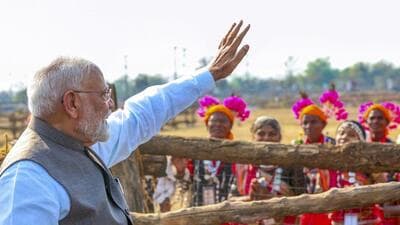 Prime Minister Narendra Modi greets supporters upon his arrival during the foundation stone laying and inauguration of multiple development projects, in Bilaspur, Chhattisgarh, on Sunday. (PMO) Prime Minister Narendra Modi greets supporters upon his arrival during the foundation stone laying and inauguration of multiple development projects, in Bilaspur, Chhattisgarh, on Sunday. (PMO)