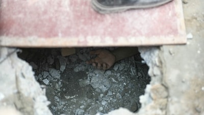 Graphic content - The hand of a victim trapped in the rubble of a damaged temple is seen in Mandalay on March 30, 2025, Residents scrambled desperately through collapsed buildings on Sunday as more than 3,400 people are still missing. (AFP) Graphic content - The hand of a victim trapped in the rubble of a damaged temple is seen in Mandalay on March 30, 2025, Residents scrambled desperately through collapsed buildings on Sunday as more than 3,400 people are still missing. (AFP)