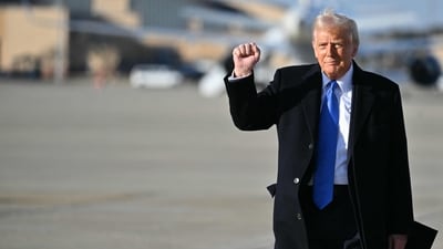 US President Donald Trump pumps his fist as he walks to board Air Force One at Joint Base Andrews in Maryland. (AFP) US President Donald Trump pumps his fist as he walks to board Air Force One at Joint Base Andrews in Maryland. (AFP)