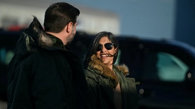 JD Vance and Usha Vance arrived to board Air Force Two after visiting the U.S. military's Pituffik Space Base on the strategically important, mineral-rich island. (via REUTERS)