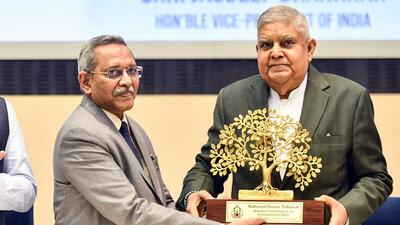 Vice President Jagdeep Dhankhar being felicitated by National Green Tribunal chairperson Justice Prakash Shrivastava during the second day of the National Conference on ‘Environment – 2025’ organised by NGT, in New Delhi on Sunday. (ANI) Vice President Jagdeep Dhankhar being felicitated by National Green Tribunal chairperson Justice Prakash Shrivastava during the second day of the National Conference on ‘Environment – 2025’ organised by NGT, in New Delhi on Sunday. (ANI)