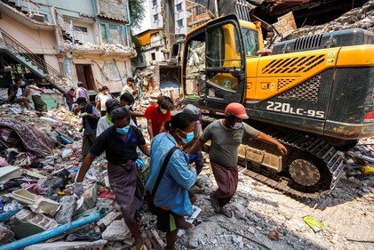 Rescuers carry the body of a victim, in the aftermath of a strong earthquake, in Mandalay, Myanmar, March 30, 2025. (REUTERS)