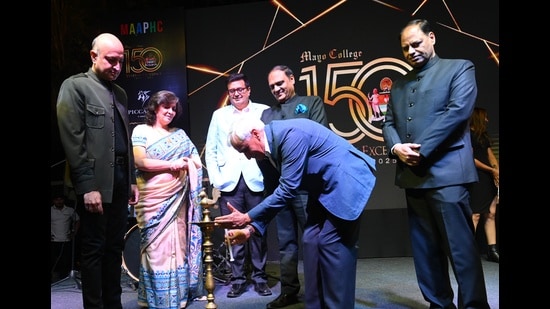 Mayo College principal Saurav Sinha (third from left) and others lighting the lamp to inaugurate the celebrations on Sunday. (Keshav Singh/HT)