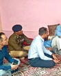 Jammu and Kashmir lieutenant governor Manoj Sinha meets the family members of a police personnel who dies during the Kathua anti-terrorist operation, on Monday. (Photo: Office of LG J&K-X)