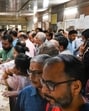 People at the Uttar Pradesh Stamp and Registration office on Sunday. (Sunil Ghosh/HT Photo)