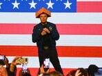 Elon Musk hands out $1m cheques to voters in Wisconsin, his odd cheese hat grabs eyeballs (Photo by Robin LEGRAND / AFP)