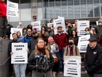 Members of the Graduate Labor Union-United Electrical, Radio and Machine Workers of America (GLU-UE) rally outside the Paul D. Wellstone Federal Building during a protest held after the University of Minnesota said an international graduate student was detained by U.S. Immigration and Customs Enforcement (ICE) agents, in Minneapolis, Minnesota, U.S. March 29, 2025. (REUTERS/Tim Evans)