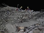 Rescue workers clear rubble on the top at the site of an under-construction building collapse in Bangkok on March 30, 2025. Rescue workers clear rubble on the top at the site of an under-construction building collapse in Bangkok on March 30, 2025.