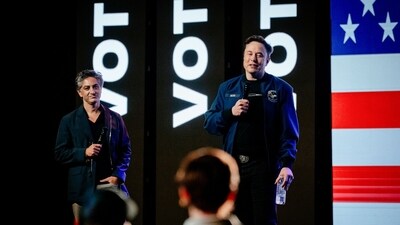 Elon Musk, chief executive officer of Tesla Inc., right, and Antonio Gracias, founder, chief executive officer and chief investment officer of Valor Equity Partners, during an America PAC town hall ahead of the Wisconsin Supreme Court election at the KI Convention Center in Green Bay, Wisconsin, US, on Sunday, March 30, 2025. (Bloomberg) Elon Musk, chief executive officer of Tesla Inc., right, and Antonio Gracias, founder, chief executive officer and chief investment officer of Valor Equity Partners, during an America PAC town hall ahead of the Wisconsin Supreme Court election at the KI Convention Center in Green Bay, Wisconsin, US, on Sunday, March 30, 2025. (Bloomberg)