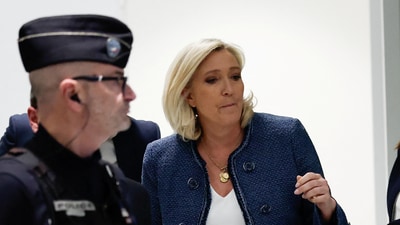 French far-right leader Marine Le Pen, member of parliament from the Rassemblement National (National Rally - RN) party, leaves the courthouse on in Paris, France, March 31, 2025. (Reuters)