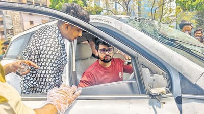 Mumbai, India. Mar 29, 2025: 21-year-old Priyanshu Vander (Red T-shirt) was detained by Mumbai police after his SUV car collided with a taxi on the Senapati Bapat Flyover in the Dadar area of Mumbai. A taxi driver and a female passenger lost their lives after a speeding SUV collided with their taxi on the Senapati Bapat flyover in the Dadar area of Mumbai on Saturday afternoon. Mumbai, India. Mar 29, 2025. (Photo by Raju Shinde/HT Photo) (Hindustan Times)