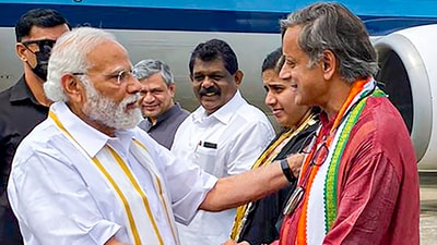Prime Minister Narendra Modi and Congress MP Shashi Tharoor. (PTI) Prime Minister Narendra Modi and Congress MP Shashi Tharoor. (PTI)