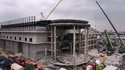 Cranes being used to lift rescue workers during search-and-rescue operations at the site of an under-construction building collapse in Bangkok. (AFP) Cranes being used to lift rescue workers during search-and-rescue operations at the site of an under-construction building collapse in Bangkok. (AFP)