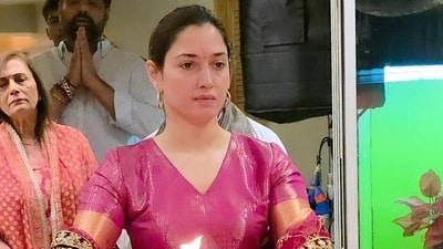 In the images, Tamannaah is seen dressed in a pink suit and deep in devotion as she dances and jumps to devotional songs with her parents and close friends. In the images, Tamannaah is seen dressed in a pink suit and deep in devotion as she dances and jumps to devotional songs with her parents and close friends.