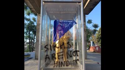Tension gripped Nangal village in Phillaur sub division of Jalandhar district on Monday after the banned terror outfit, Sikhs for Justice (SFJ), disfigured the protective glass installed around the statue of BR Ambedkar, the architect of the Indian Constitution. (HT Photo) Tension gripped Nangal village in Phillaur sub division of Jalandhar district on Monday after the banned terror outfit, Sikhs for Justice (SFJ), disfigured the protective glass installed around the statue of BR Ambedkar, the architect of the Indian Constitution. (HT Photo)
