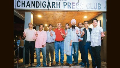 The newly elected governing council of Chandigarh Press Club celebrating their win on Sunday night. (HT Photo)
