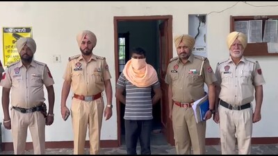 The rape accused in police custody. The rape accused in police custody.