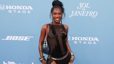 US rapper and singer Doechii arrives for the Billboard Women in Music, honoring US rapper and singer Doechii as Billboard Woman of the Year, at YouTube Theater at Hollywood Park in Inglewood, California, on March 29, 2025. (Photo by ETIENNE LAURENT / AFP) (AFP)