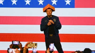 Elon Musk hands out $1m cheques to voters in Wisconsin, his odd cheese hat grabs eyeballs (Photo by Robin LEGRAND / AFP) (AFP) Elon Musk hands out $1m cheques to voters in Wisconsin, his odd cheese hat grabs eyeballs (Photo by Robin LEGRAND / AFP) (AFP)