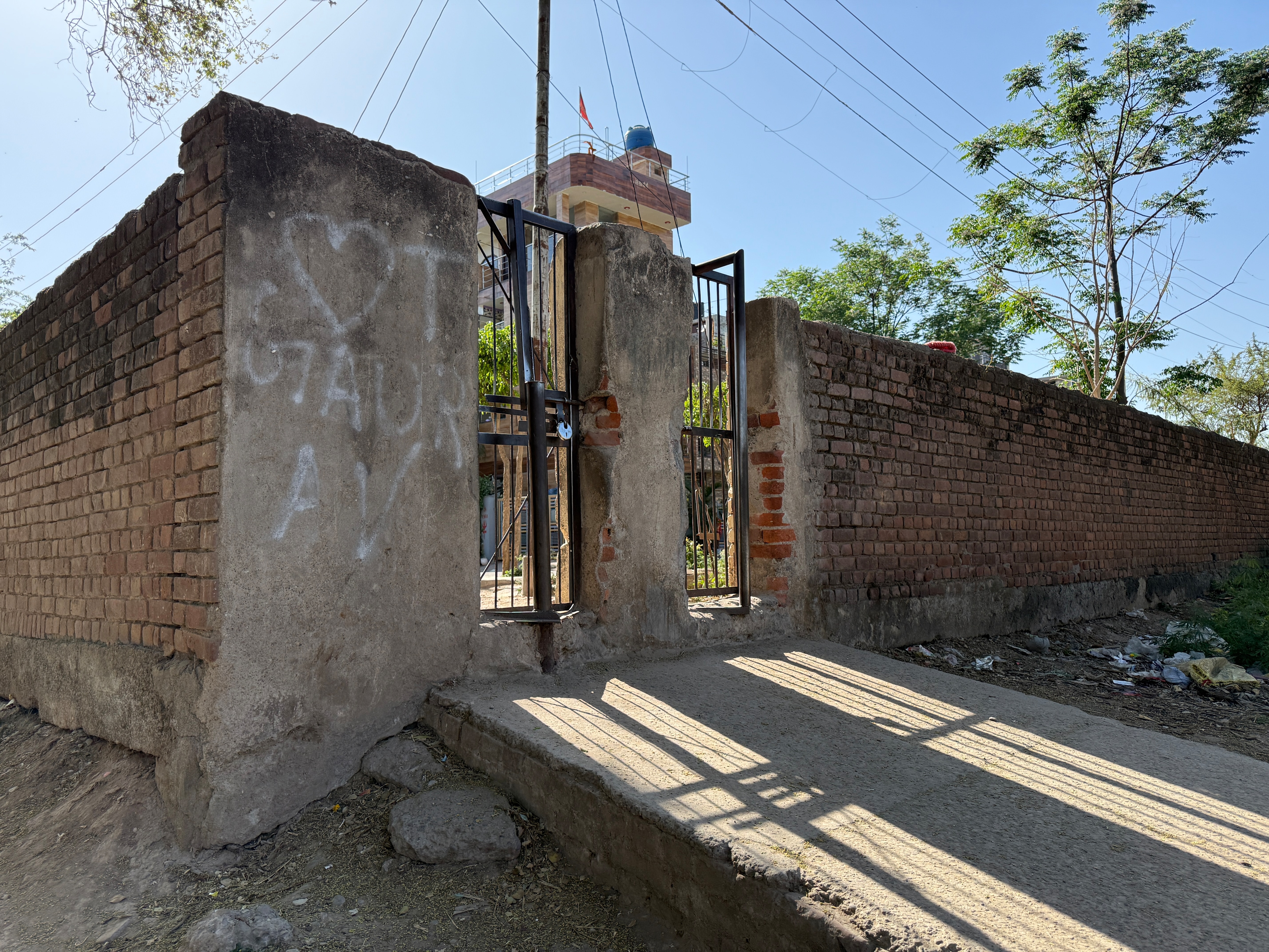 The easy-to-scale wall between the PU campus and Sector 25 Bhaskar Colony, one of the many ignored security lapses at the university. (HT) The easy-to-scale wall between the PU campus and Sector 25 Bhaskar Colony, one of the many ignored security lapses at the university. (HT)