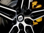 The logo of Xiaomi is seen on a tyre wheel of Xiaomi's first electric vehicle SU7, which is displayed at a showroom of a newly opened Xiaomi store in Beijing, China March 25, 2024.