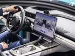The controls and screen interface of a Xiaomi SU7 Ultra electric vehicle at the MWC25 tech show in Barcelona, Spain on March 3, 2024.
