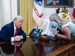 US President Donald Trump, left, and Karoline Leavitt, White House press secretary, speak during an executive order signing in the Oval Office of the White House in Washington, DC, US, on Monday, March 31, 2025. US President Donald Trump, left, and Karoline Leavitt, White House press secretary, speak during an executive order signing in the Oval Office of the White House in Washington, DC, US, on Monday, March 31, 2025.