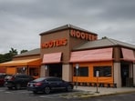 Hooters of America is reportedly working with creditors on a plan to restructure the business through bankruptcy court.