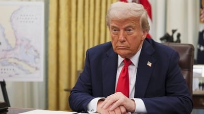 President Donald Trump listens to a question from a reporter before signing an executive order in the Oval Office of the White House in Washington. (AP) President Donald Trump listens to a question from a reporter before signing an executive order in the Oval Office of the White House in Washington. (AP)