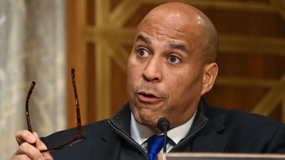 New Jersey Democratic Sen. Cory Booker's staffer was arrested for allegedly carrying gun on Capitol grounds. (AFP)