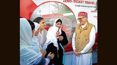 J&K chief minister Omar Abdullah interacts with students during the flagging-off ceremony of free bus service for women, at SKICC in Srinagar on Tuesday (ANI) J&K chief minister Omar Abdullah interacts with students during the flagging-off ceremony of free bus service for women, at SKICC in Srinagar on Tuesday (ANI)