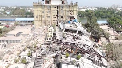 With the Mandalay airport being damaged and the control tower toppled in the capital Naypitaw's airport, all commercial flights into the cities have been shut down. In pic: An aerial view shows flattened buildings and one damaged following an earthquake on (via REUTERS)