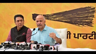 Punjab in-charge of Aam Aadmi Party (AAP) Manish Sisodia with AAP Punjab president Aman Arora addressing mediapersons in Ludhiana on Tuesday. (Gurpreet Singh/HT)