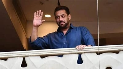 Salman Khan waving at fans from his Galaxy apartment. Salman Khan waving at fans from his Galaxy apartment.