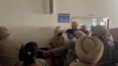 Self-styled pastor Bajinder Singh (wearing cap) being whisked away by Punjab Police personnel after he was sentenced to life imprisonment till death by a Mohali court on Tuesday. (HT Photo) Self-styled pastor Bajinder Singh (wearing cap) being whisked away by Punjab Police personnel after he was sentenced to life imprisonment till death by a Mohali court on Tuesday. (HT Photo)