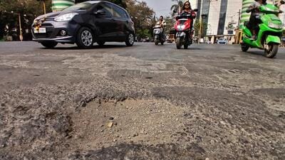 Two-wheelers have a tough time negotiating damaged patches and many motorists fall off and get injured (Praful Gangurde /HT Photo) Two-wheelers have a tough time negotiating damaged patches and many motorists fall off and get injured (Praful Gangurde /HT Photo)
