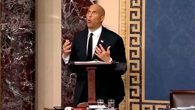 US Senator Cory Booker delivered a record breaking speech protesting the policies of US President Donald Trump (REUTERS)