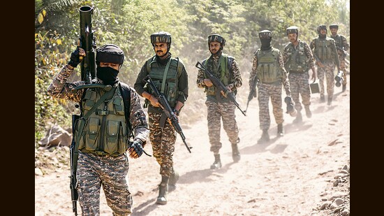 Security personnel keep vigil in the Panjtirthi Jathana area of Kathua district on Tuesday (PTI)