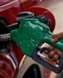 A worker holds a nozzle to pump petrol into a vehicle at a fuel station in Mumbai, India, May 21, 2018. REUTERS/Francis Mascarenhas/Files (HT Archive) A worker holds a nozzle to pump petrol into a vehicle at a fuel station in Mumbai, India, May 21, 2018. REUTERS/Francis Mascarenhas/Files (HT Archive)