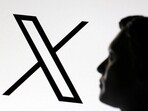 A 3D-printed miniature model of Elon Musk and the X logo are seen in this illustration taken January 23, 2025.