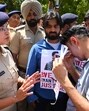 Superintendent of police (SP, City) Geetanjali Khandewal consoling victim Aditya Thakur’s father amid the protests on the Panjab University campus on Tuesday. (Keshav Singh/HT) Superintendent of police (SP, City) Geetanjali Khandewal consoling victim Aditya Thakur’s father amid the protests on the Panjab University campus on Tuesday. (Keshav Singh/HT)