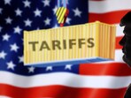 A 3D-printed miniature model of U.S. President Donald Trump, U.S. Flag and word "Tariffs" are seen in this illustration taken, April 2, 2025. 
