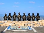 A specialist boarding team and Marine Commandos boarded the suspect vessel and conducted a thorough search, revealing various sealed packets. A specialist boarding team and Marine Commandos boarded the suspect vessel and conducted a thorough search, revealing various sealed packets.