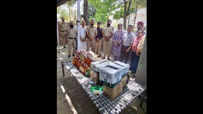 A cache of illicit liquor recovered by the excise department in Ludhiana on Wednesday. (HT Photo)