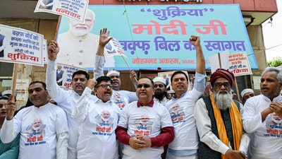 Supporters of the Jannat Muslim Committee hold placards in support of the Waqf Amendment Bill and participate in a thanksgiving event at Ghalib Academy, Hazrat Nizamuddin, New Delhi, on Wednesday. (ANI) Supporters of the Jannat Muslim Committee hold placards in support of the Waqf Amendment Bill and participate in a thanksgiving event at Ghalib Academy, Hazrat Nizamuddin, New Delhi, on Wednesday. (ANI)