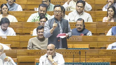 Union Parliamentary Affairs Minister Kiren Rijiju presents the Waqf Amendment Bill in Lok Sabha during the Budget Session of Parliament in New Delhi on Wednesday. (Sansad TV) Union Parliamentary Affairs Minister Kiren Rijiju presents the Waqf Amendment Bill in Lok Sabha during the Budget Session of Parliament in New Delhi on Wednesday. (Sansad TV)